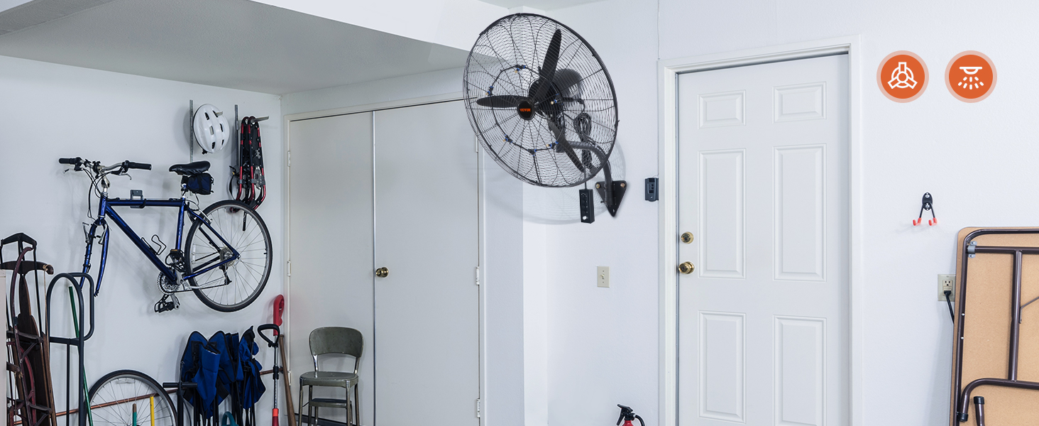 VEVOR wall-mount misting fan in a garage, with a bicycle and equipment hung on the wall.