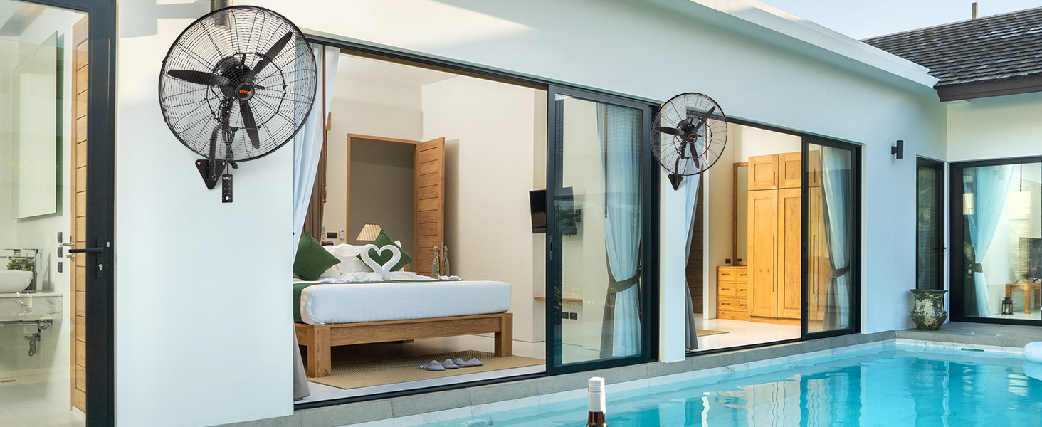 luxury villa with a VEVOR wall-mount misting fan near sliding glass doors by the pool.