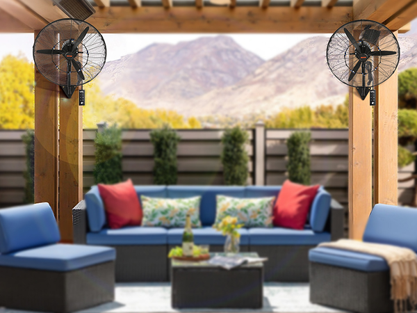 outdoor patio with two VEVOR wall-mount misting fans on wooden beams, mountains and greenery in the background.