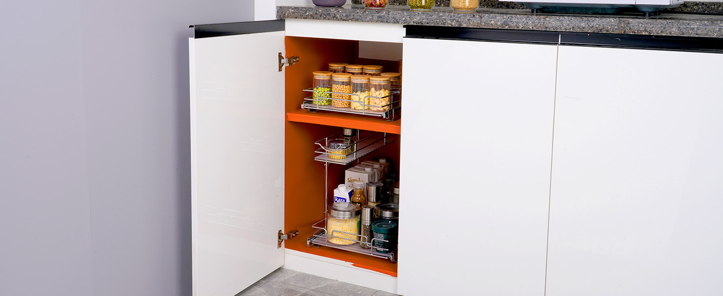 open white kitchen cabinet with VEVOR pull out cabinet organizer holding food jars and spices.