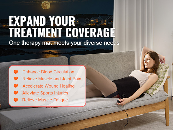 woman using the VEVOR red light therapy mat on a couch to alleviate muscle and joint pain and enhance blood circulation.