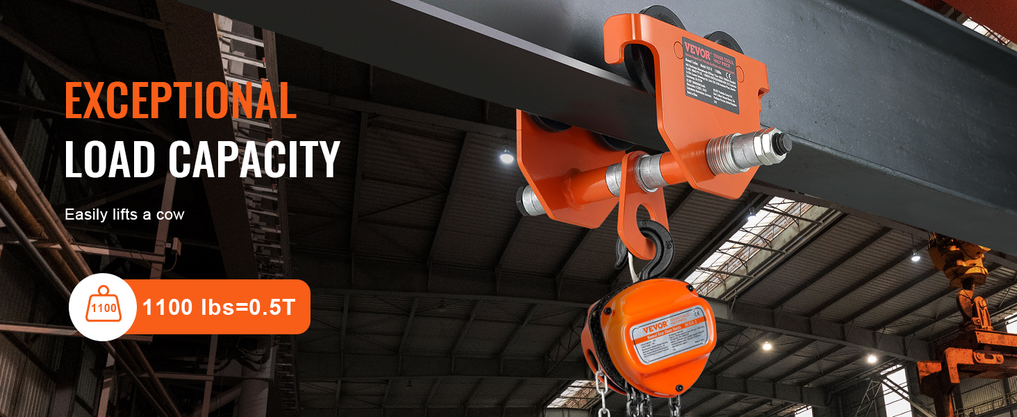 VEVOR manual trolley lifting 1100 lbs in an industrial setting with exceptional load capacity text.