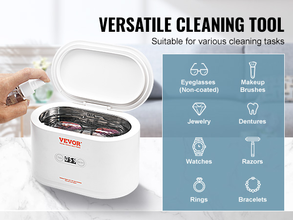 hand using the VEVOR ultrasonic jewelry cleaner with open lid, suitable for various cleaning tasks.
