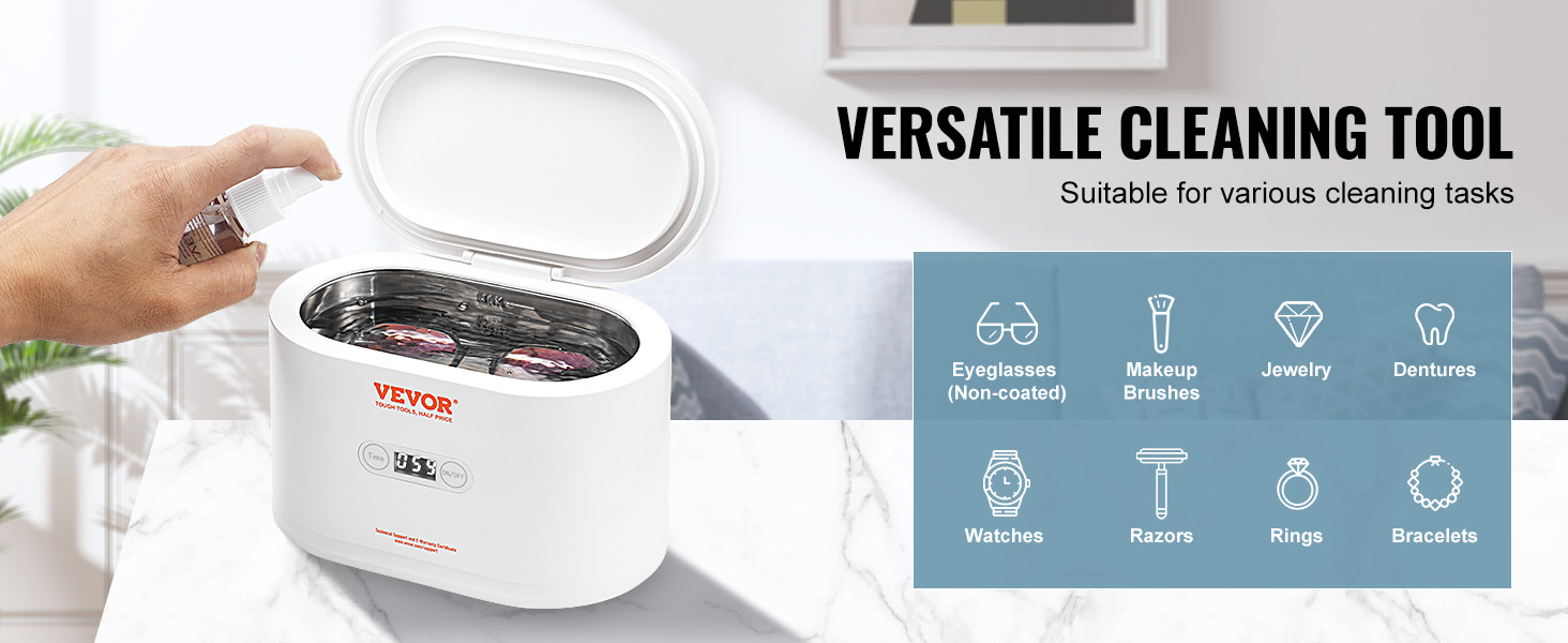 hand using the VEVOR ultrasonic jewelry cleaner with open lid, suitable for various cleaning tasks.