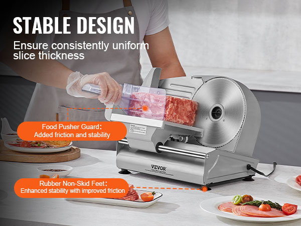 VEVOR meat slicer cutting meat with food pusher guard on a kitchen counter surrounded by sliced meat.