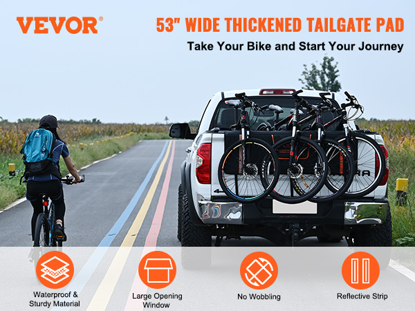 VEVOR tailgate pad on a truck carrying bicycles, promoting 53" thickened pad with waterproof material.