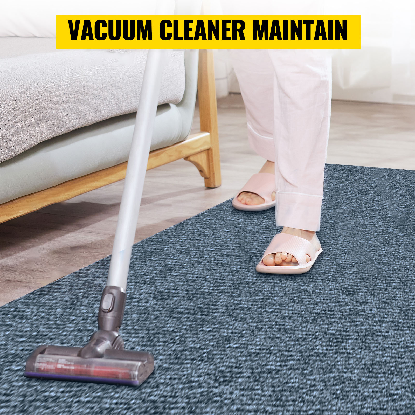person vacuuming a VEVOR marine carpet with a dyson vacuum cleaner.