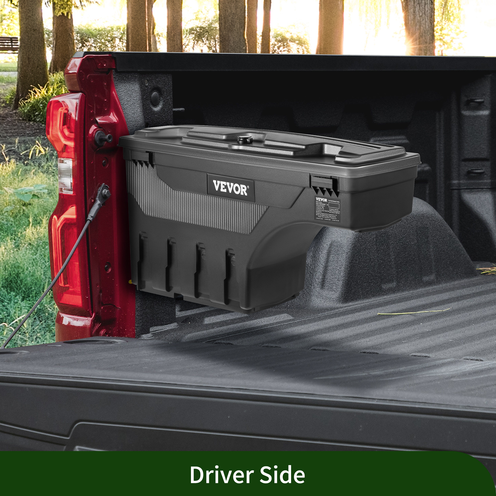 VEVOR truck bed storage box installed on a red truck bed, driver's side, in a wooded area.