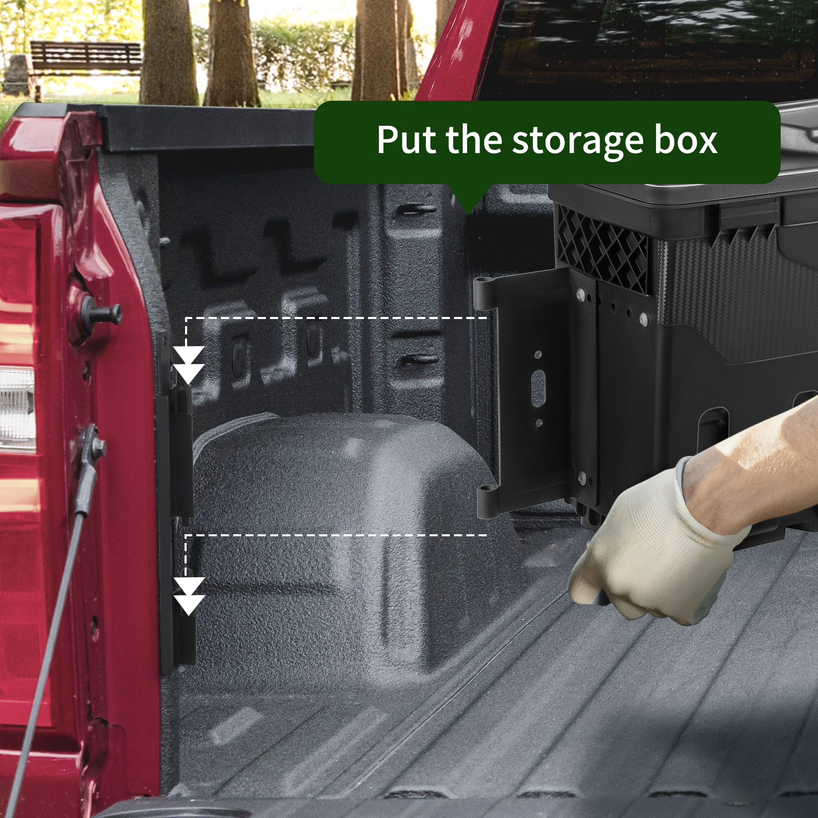inserting VEVOR truck bed storage box into a red truck bed with glove-wearing hand.