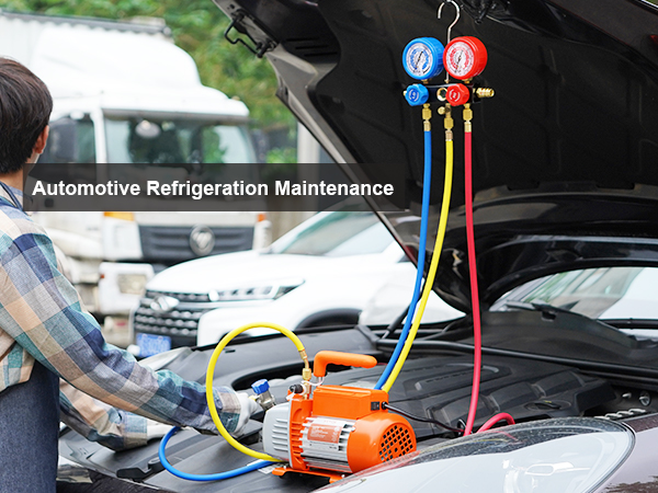 VEVOR ac vacuum pump used in automotive refrigeration maintenance with multicolored hoses and gauges.