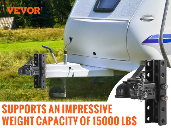 VEVOR adjustable trailer coupler attached to a travel trailer in a grassy field with a weight capacity of 15000 lbs.