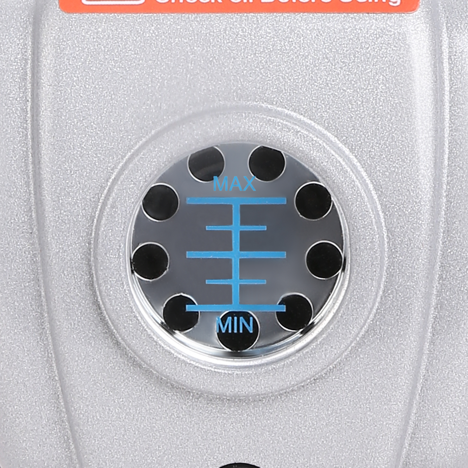 close-up of VEVOR vacuum pump gauge with max and min levels against a textured silver background.