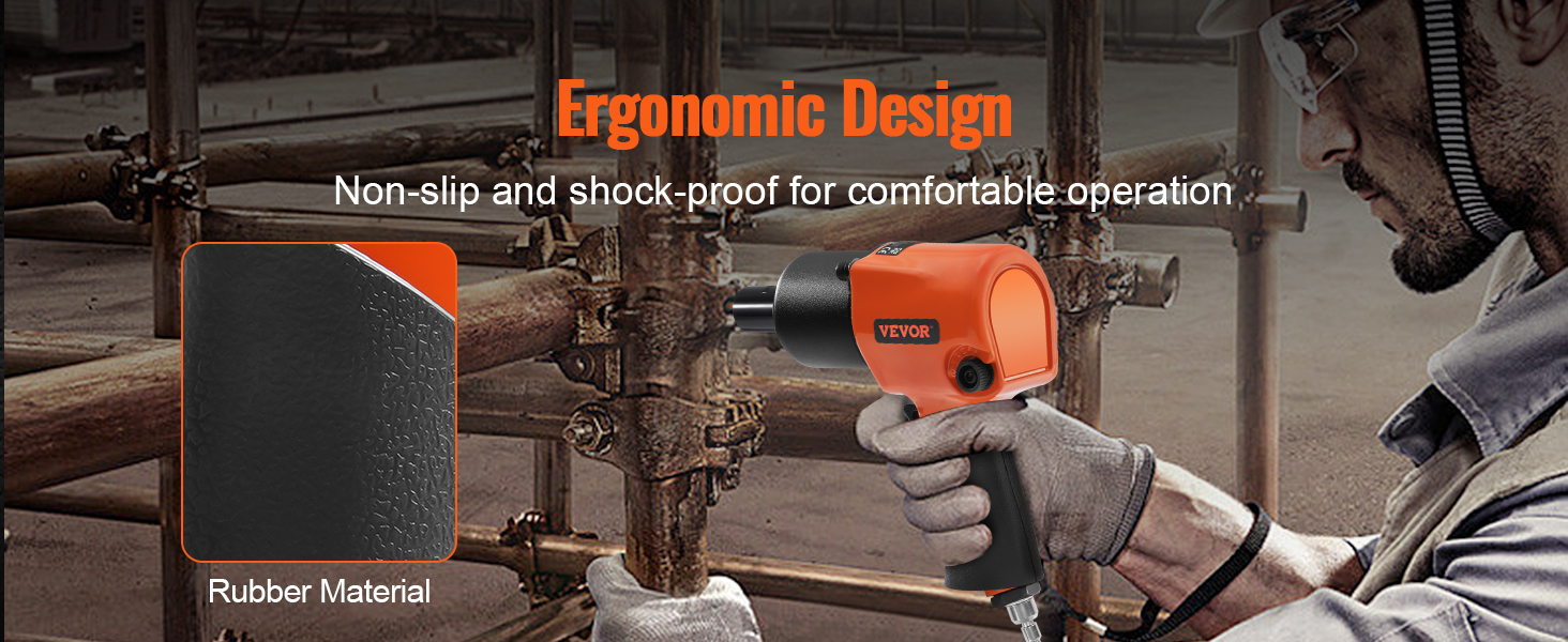 Darbinieks, kas izmanto VEVOR pneimatisko triecienskrūvgriezi ar ergonomisku dizainu un neslīdošu gumijas materiālu komfortam.