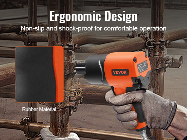 Darbinieks, kas izmanto VEVOR pneimatisko triecienskrūvgriezi ar ergonomisku dizainu un neslīdošu gumijas materiālu.