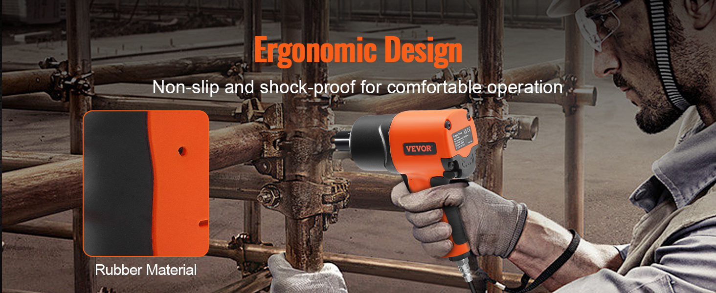 Darbinieks, kas izmanto VEVOR pneimatisko triecienskrūvgriezi ar ergonomisku dizainu un neslīdošu gumijas materiālu.