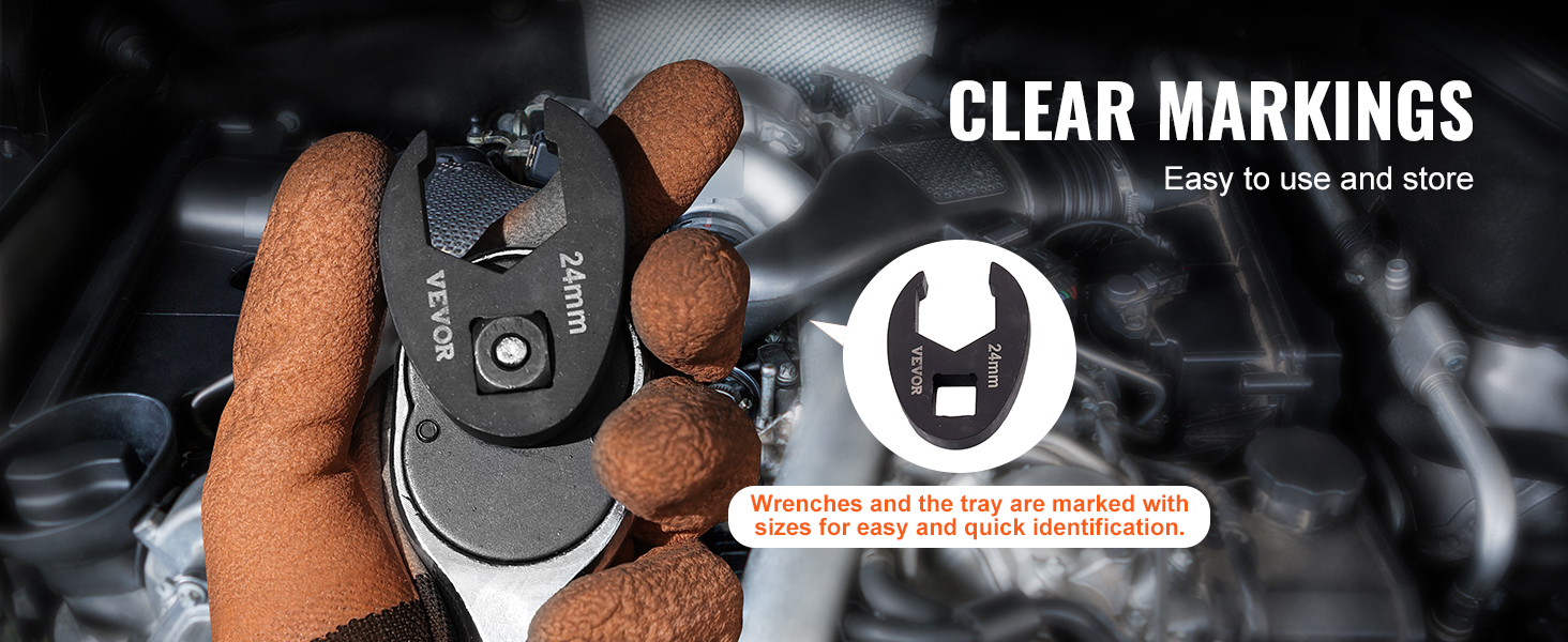 gloved hand holding a 24mm VEVOR crowfoot wrench with clear size markings for easy identification.