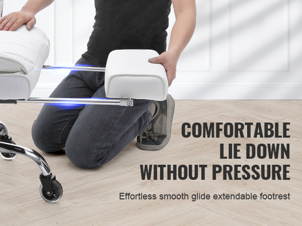 VEVOR reclining office chair with extendable footrest being adjusted by a person on wooden floor.