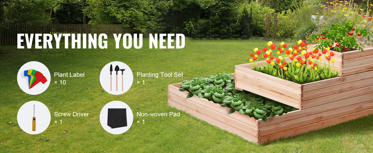 VEVOR raised garden bed with plants, tools, plant labels, screw driver, and non-woven pad on lawn.