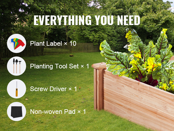 VEVOR raised garden bed with tools, plant labels, and non-woven pad in a lush backyard garden.