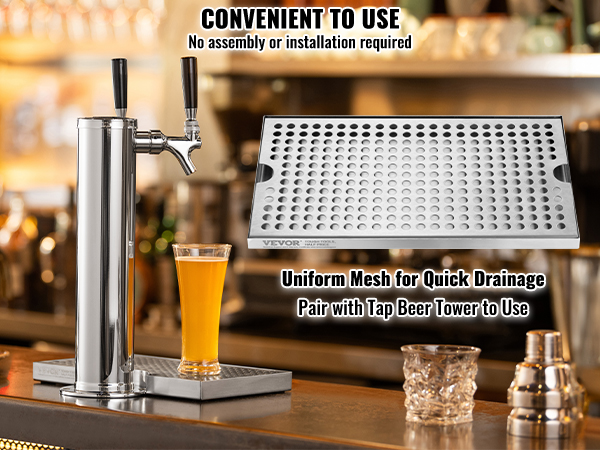 VEVOR beer drip tray with tap, glass of beer, and lemon slices in a cozy bar setting.
