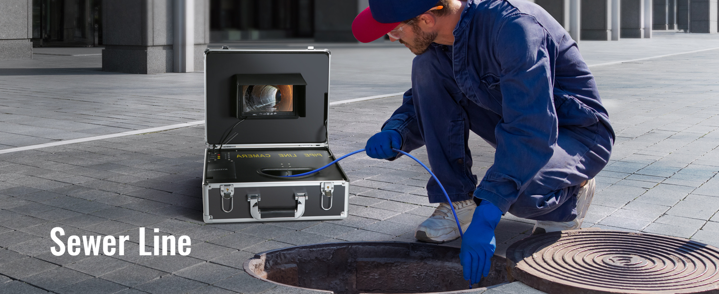technician using VEVOR sewer camera to inspect a sewer line near an open manhole on a paved street.