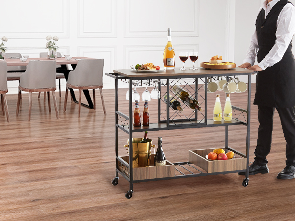 restaurant with a VEVOR bar cart holding drinks, glassware, and food, set on a wooden floor.