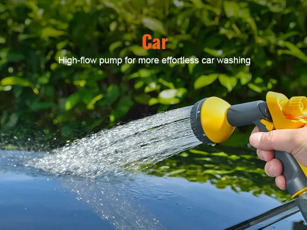 hand using VEVOR 12v water pressure diaphragm pump for car washing, spraying water on car surface.
