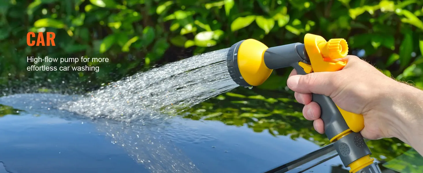 hand using VEVOR 12v water pressure diaphragm pump for car washing, spraying water on car surface.