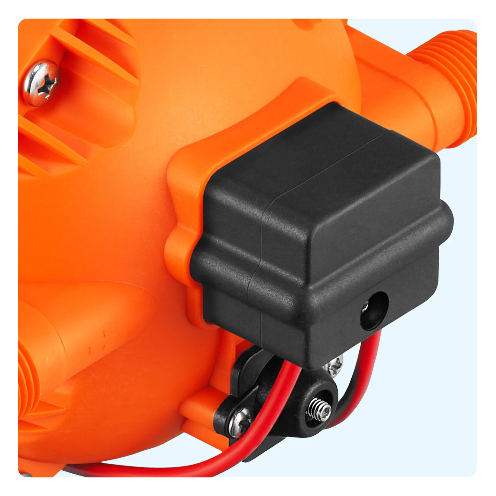 orange and black VEVOR 12v water pressure diaphragm pump close-up with red wiring