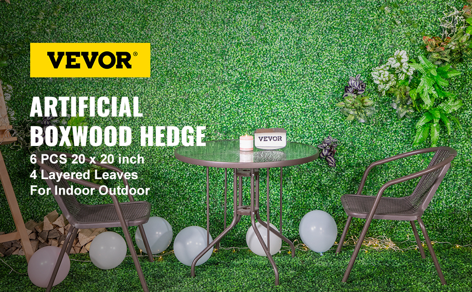 VEVOR artificial boxwood panels setup with table, chairs, and balloons for indoor/outdoor use.