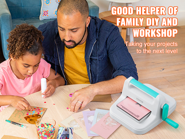 family crafting with VEVOR die cutting machine, creating colorful diy projects on a wooden table.