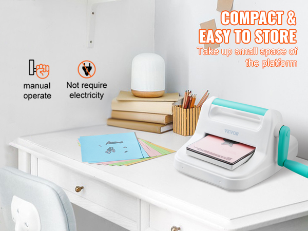 VEVOR die cutting machine, compact and easy to store on a white desk with colorful craft papers.