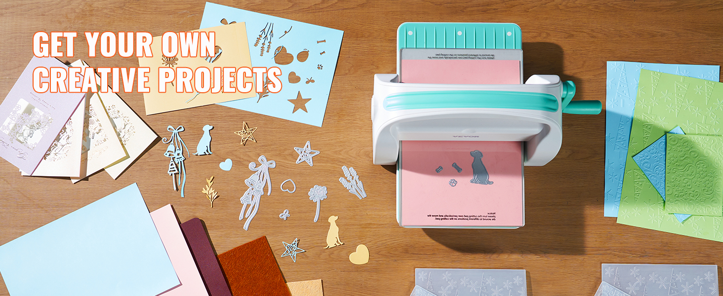 VEVOR die cutting machine on a table with craft paper, cutouts, and project materials.
