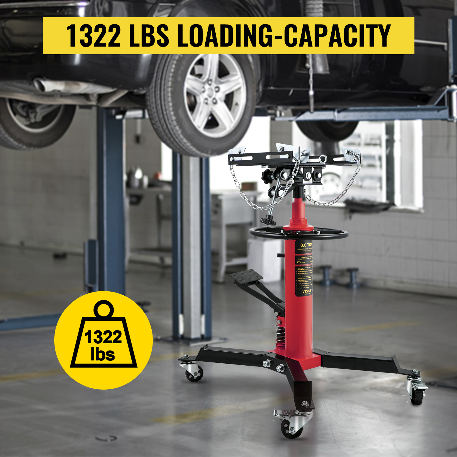 VEVOR transmission jack with 1322 lbs loading capacity in an auto repair shop.
