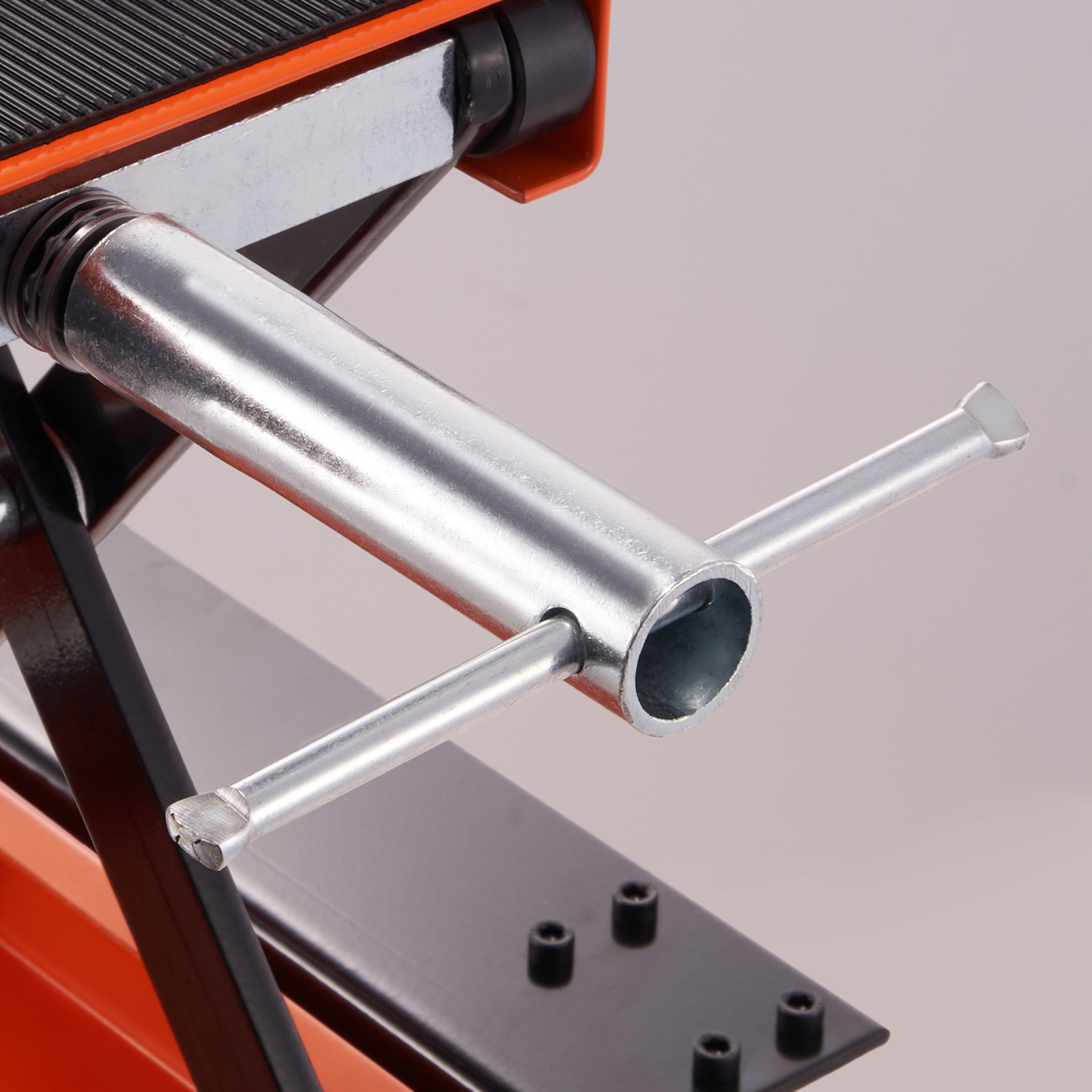 close-up of the adjustment handle and support bar of a VEVOR motorcycle lift in silver and orange.