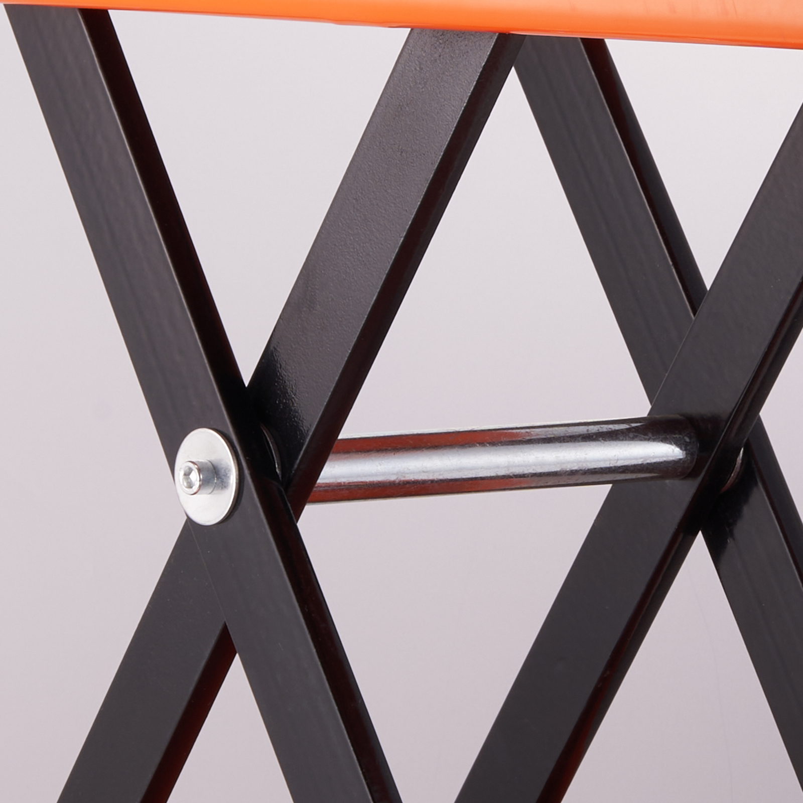 black metal crossbars with bright orange top on VEVOR motorcycle lift.