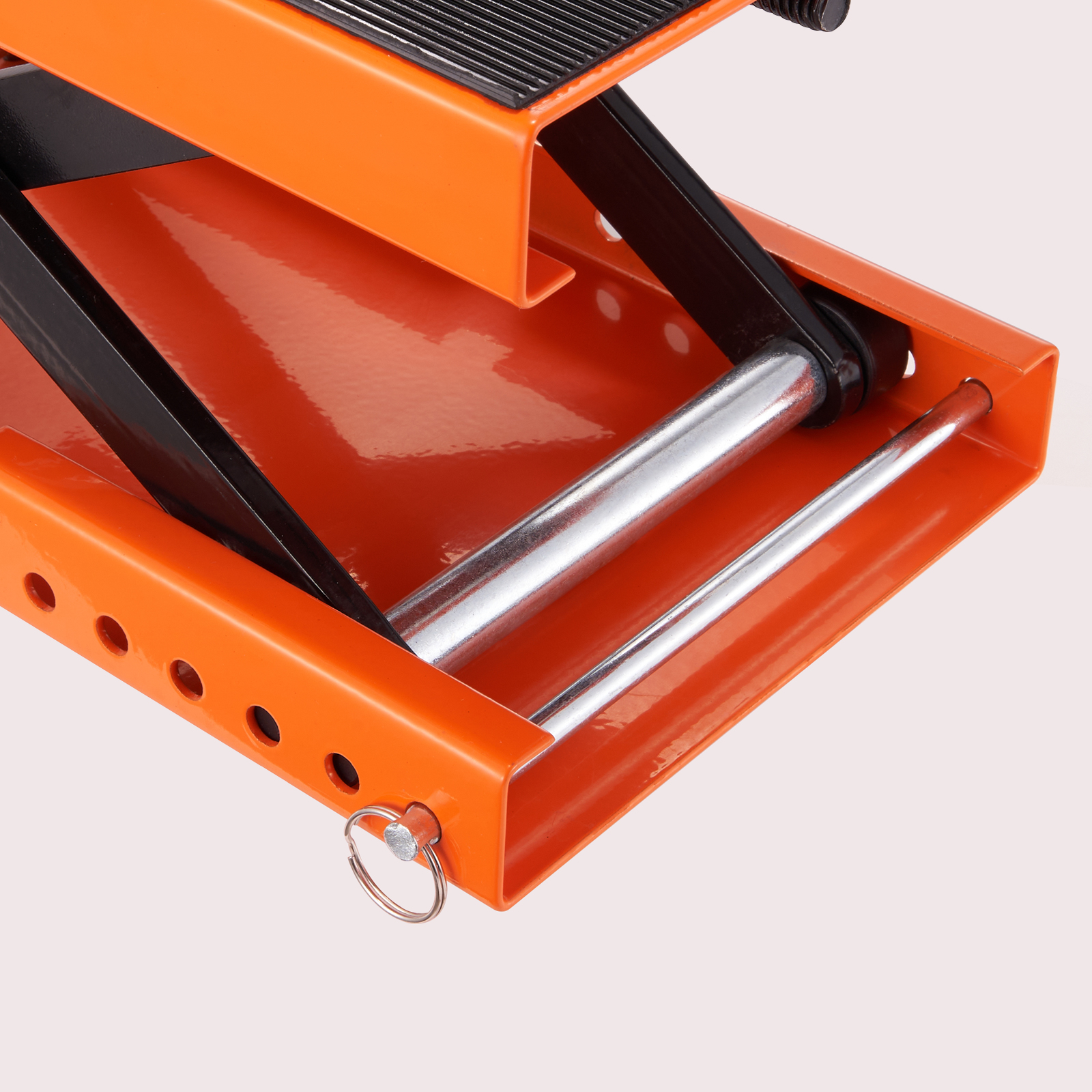 orange VEVOR motorcycle lift with a steel frame and non-slip platform, close-up view.