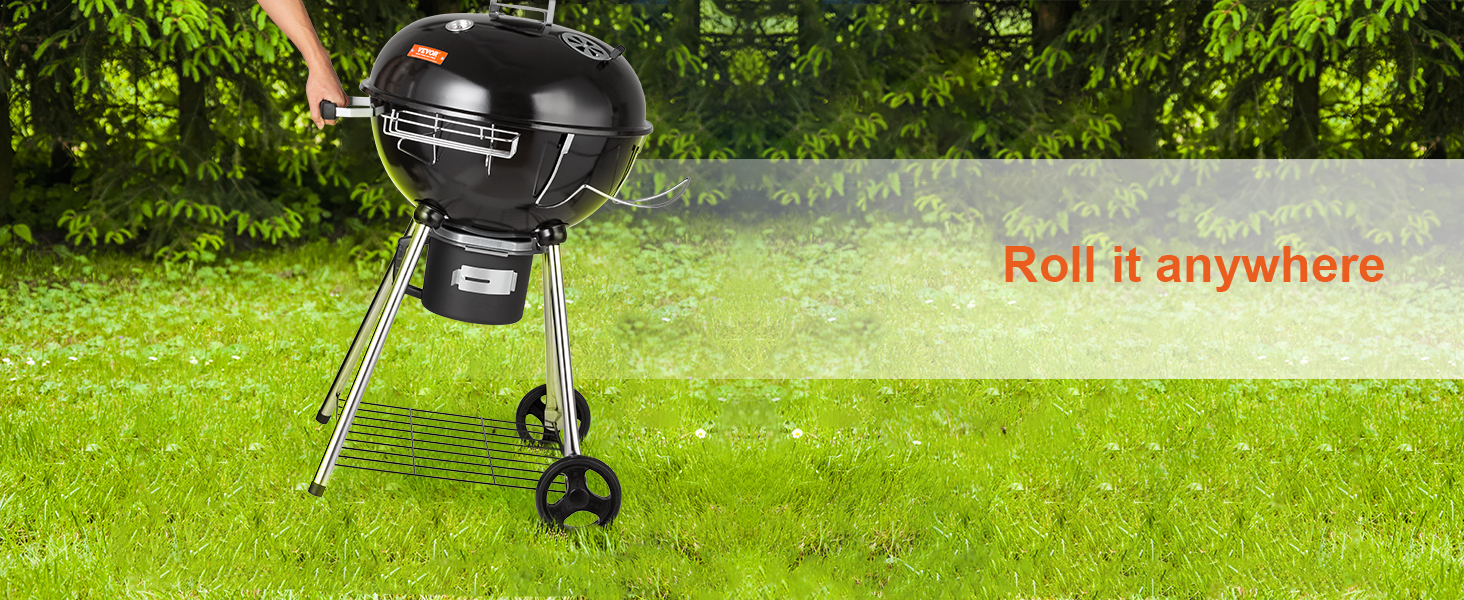 portable VEVOR kettle charcoal grill with wheels on green lawn, perfect for outdoor grilling.