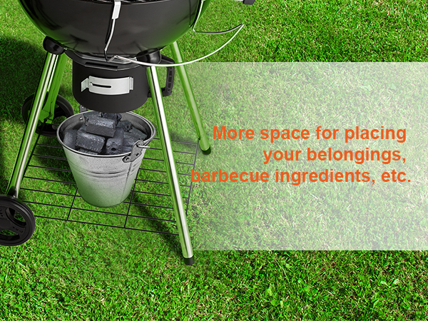 VEVOR kettle charcoal grill with storage space, bucket, and wheels on green grass background.