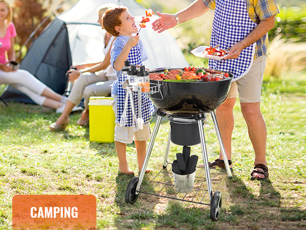family camping with a VEVOR kettle charcoal grill, enjoying bbq under a tent with lush greenery around.