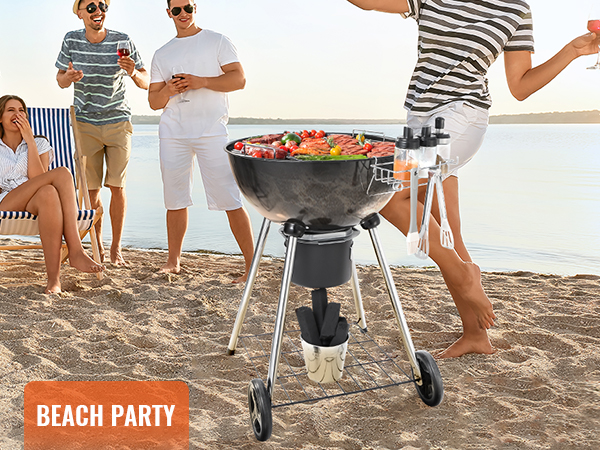 beach party with VEVOR kettle charcoal grill, featuring bbq food, and people enjoying by the sandy shore.