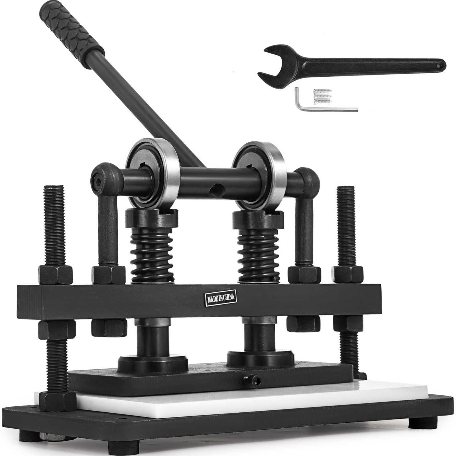 VEVOR leather cutting machine with handle and included wrench.