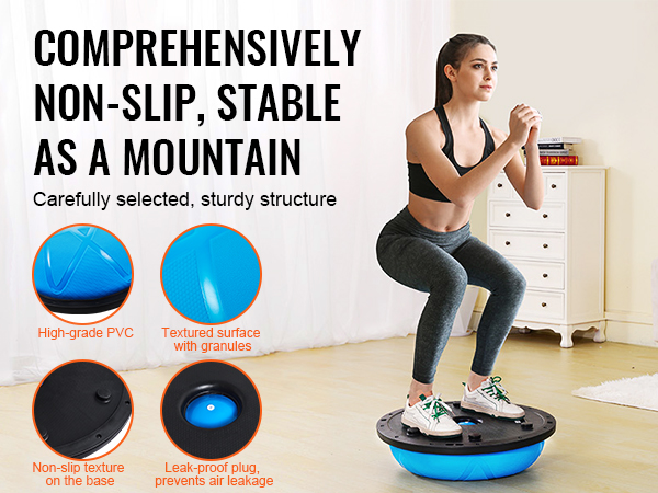 woman squatting on VEVOR half exercise ball trainer in living room, showing non-slip textured surface and leak-proof plug.