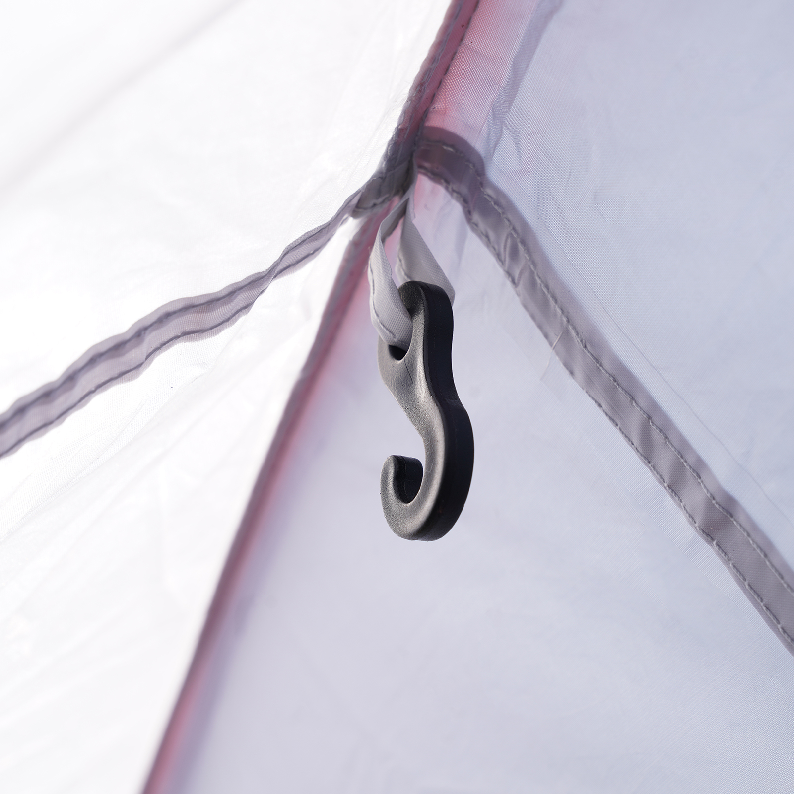 tent interior with a plastic hook attached to the fabric, VEVOR truck bed tent.