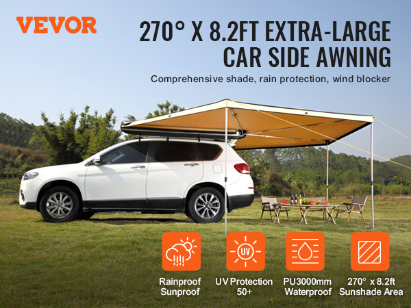 VEVOR vehicle awning providing shade for suv, picnic setup, and chairs in a grassy outdoor area.