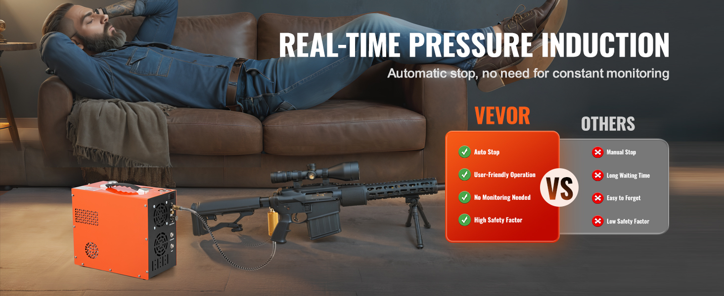 VEVOR pcp air compressor next to a rifle on the floor while a person relaxes on a couch in the background.