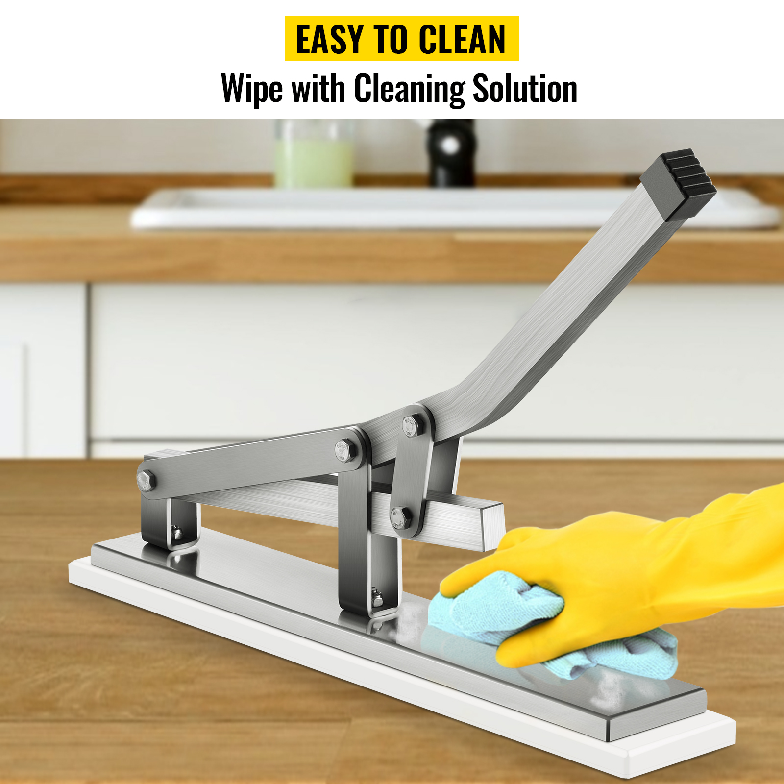 VEVOR stone crab cracker cleaning with a cloth in the kitchen, highlighting ease of cleaning.