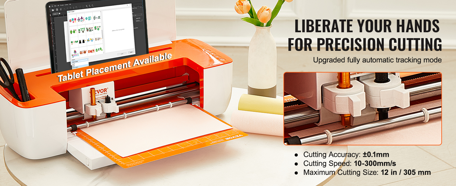 VEVOR vinyl cutter machine with tablet placement, vase with flowers, and scissors on a desk.