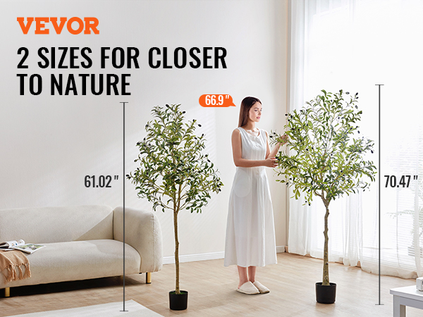VEVOR artificial olive tree in 2 sizes on display in a minimalistic living room with a beige sofa.