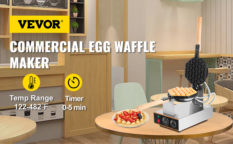 VEVOR bubble waffle maker on a table in a modern kitchen with waffles and fruits.